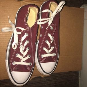 Chuck Taylor maroon shoes